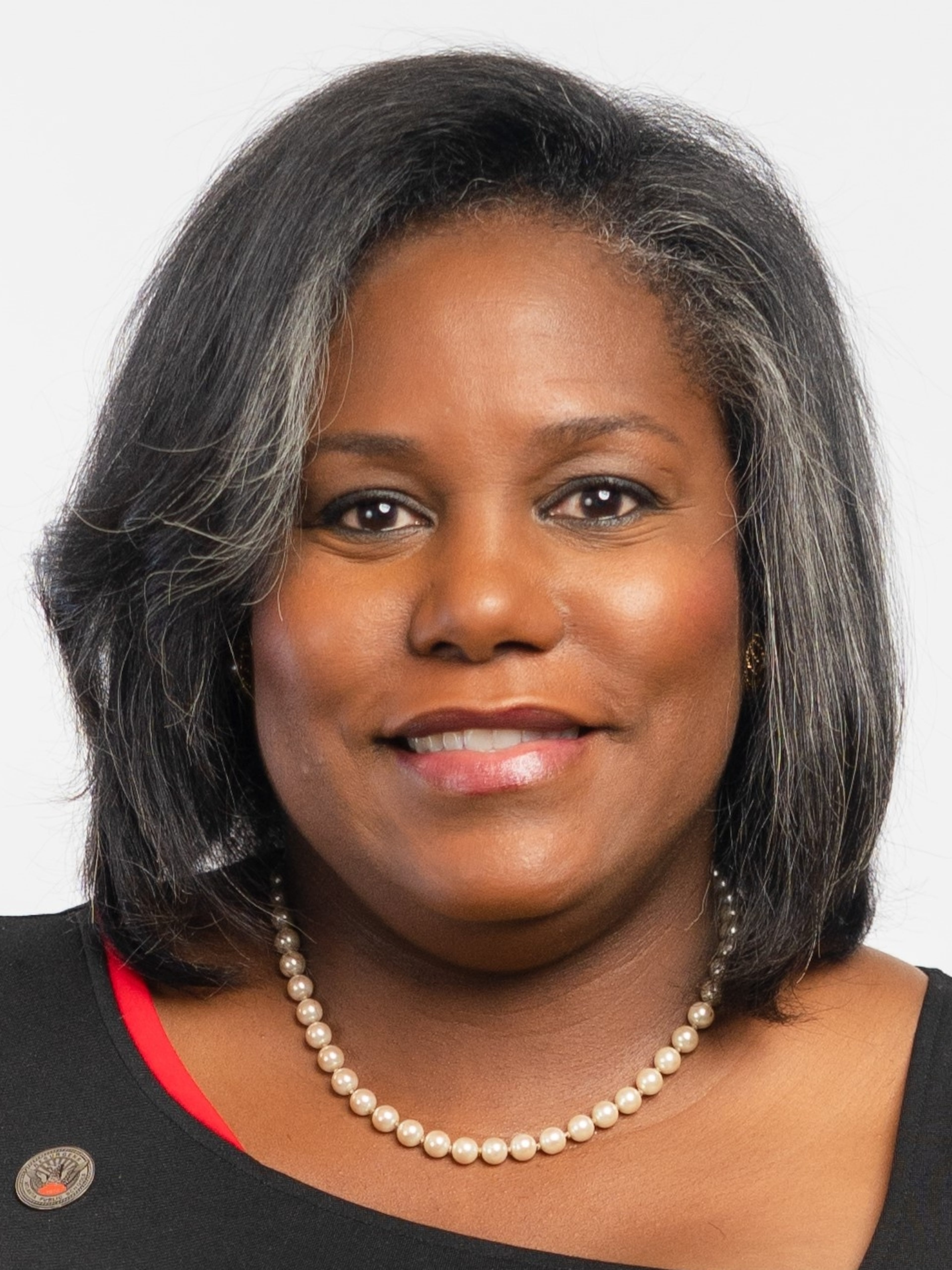 An ethics complaint against Erika Mitchell alleges she violated district policy by hiring a consulting firm without input from the school board. (Handout)