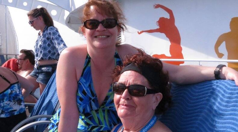 Nancy Dumbach (seated), 80, is fighting lung cancer, which places at greater risk for the consequences of a coronavirus infection. Her daughter, Susan Prince, is helping her mom take extreme precautions in the face of the pandemic. The two are seen here in more worry-free days before the pandemic. SPECIAL