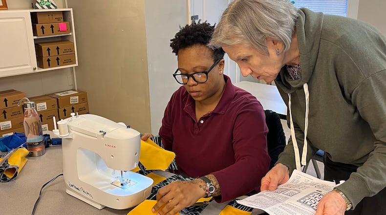 Volunteer teacher Fonde Werts helps Candice Boles with the next step of her quilt at the Women's Transitional Center.
(Courtesy HeartBound Ministries)
