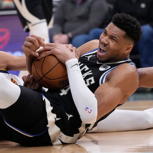 Milwaukee Bucks' Giannis Antetokounmposaid he expects to miss four to six weeks after he suffered a second injury to his right calf Friday night. (Morry Gash/AP)