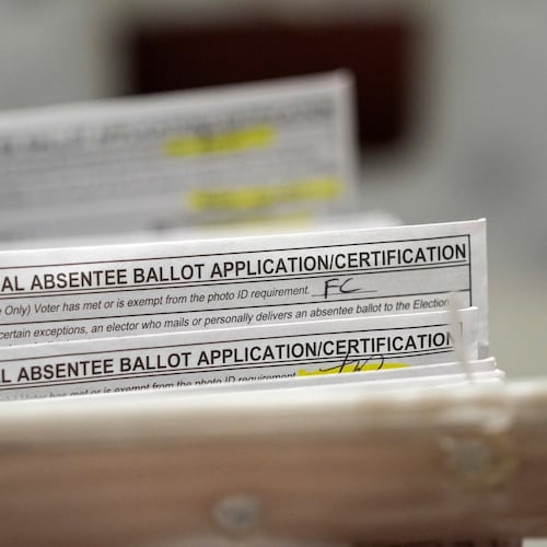 FILE - Absentee ballots during a count at the Wisconsin Center, Nov. 8, 2022, in Milwaukee. (AP Photo/Morry Gash, File)
