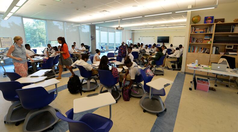In a file photo from 2014, an open classroom design allows for co-teaching of two classes in some areas. The Charles R Drew Charter School Junior and Senior Academy at the Charlie Yates campus is shown. KENT D. JOHNSON/KDJOHNSON@AJC.COM