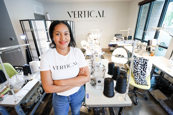 Tia Robinson, founder and CEO of Vertical Activewear, at the studio in Duluth. Robinson’s business may experience advantages from tariffs since all the fabrics and materials used are sourced from manufacturers within the United States. (Miguel Martinez/ AJC)