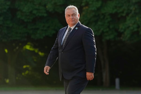 Hungary's Prime Minister Viktor Orban arrives for a formal dinner at the Paleis Huis ten Bosch ahead of the NATO summit in The Hague, Netherlands, Tuesday, June 24, 2025. (AP Photo/Markus Schreiber)