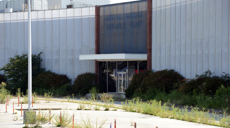 The Doraville GM plant sits idle behind locked gates on Friday, September 7, 2012. (HYOSUB SHIN / HSHIN@AJC.COM)