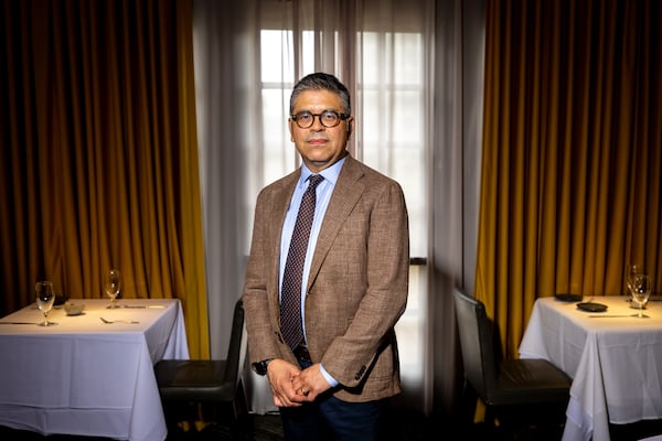 General manager and owner Andres Loaiza poses at the restaurant Aria in Atlanta on Thursday. "This is an acknowledgment to (our staff) that our hard work pays off," he said. (Arvin Temkar/AJC)