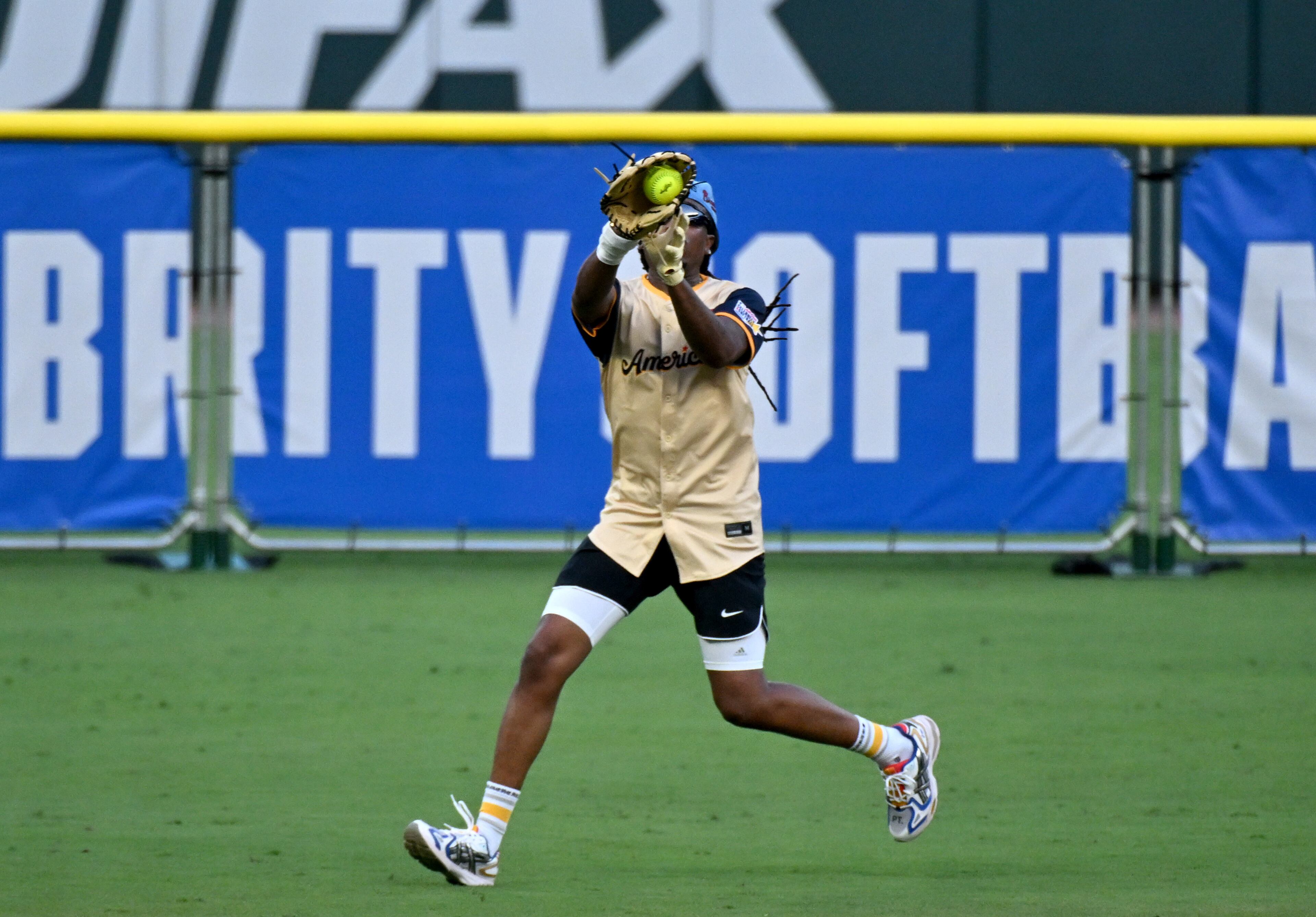 American League’s Quavo makes a catch during the MLB All-Star Celebrity Softball Game at Truist Park, Saturday, July 12, 2025, in Atlanta. (Hyosub Shin / AJC)