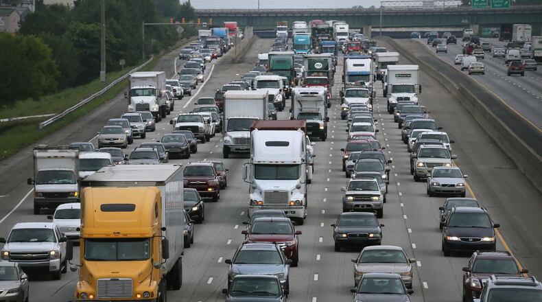 State officials are studying ways to improve funding for infrastructure projects to ease congestion at spots like this one on I-75 south of where it merges with I-575. A study committee meeting held its final meeting Thursday before its Nov. 30 deadline to make recommendations to the General Assembly. BOB ANDRES / BANDRES@AJC.COM