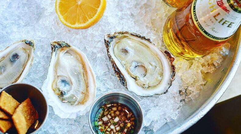 Head to One Eared Stag for $1 seafood and beer today. Photo credit: One Eared Stag.