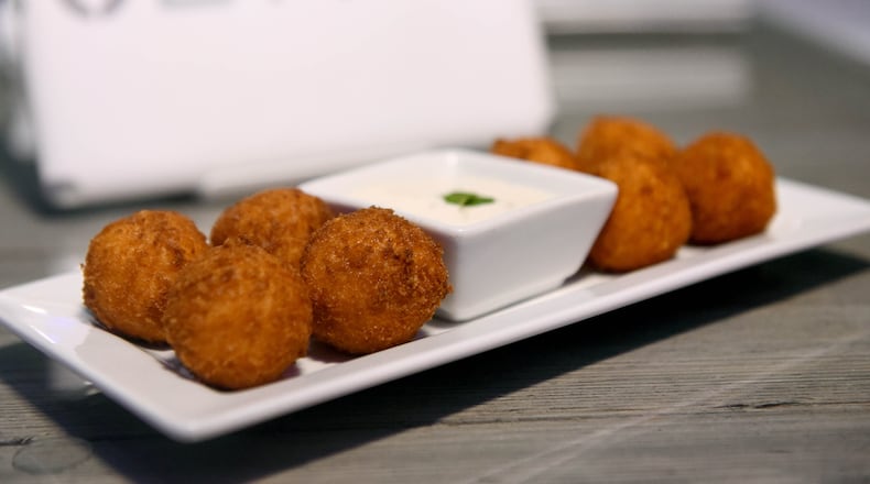 February 12, 2019 Atlanta - One of BYTES featured items on the menu are their Buffalo Chicken Bytes (oven baked chicken, buffalo sauce, cheddar cheese, and green onions). RYON HORNE / RHORNE@AJC.COM