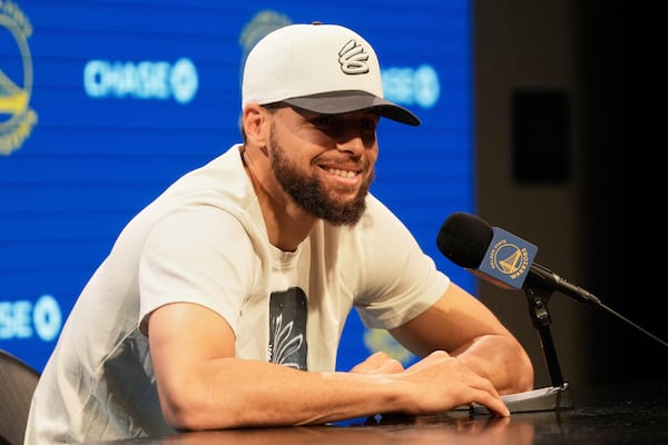 Golden State Warriors guard Stephen Curry speaks during a news conference at the NBA basketball team's basketball facility in San Francisco, Thursday, May 15, 2025. (AP Photo/Jeff Chiu)