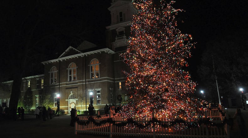 The huge decorated Christmas Tree lit up the court yard at the Historic Courthouse in Lawrenceville, Georgia Saturday, Dec. 11, 2010. FILE PHOTO
