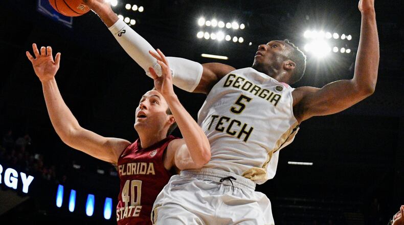 Florida State forward Brandon Allen (40) and Georgia Tech guard Josh Okogie (5) vie for a rebound during the second half of an NCAA basketball game Wednesday, Jan. 25, 2017, in Atlanta. Georgia Tech won 78-56. (AP Photo/John Amis)