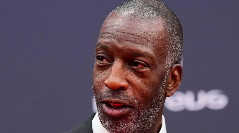 FILE - Former U.S. sprinter Michael Johnson arrives at the Laureus Sports Awards ceremony in Madrid, Monday, April 22, 2024. (AP Photo/Manu Fernandez, File)