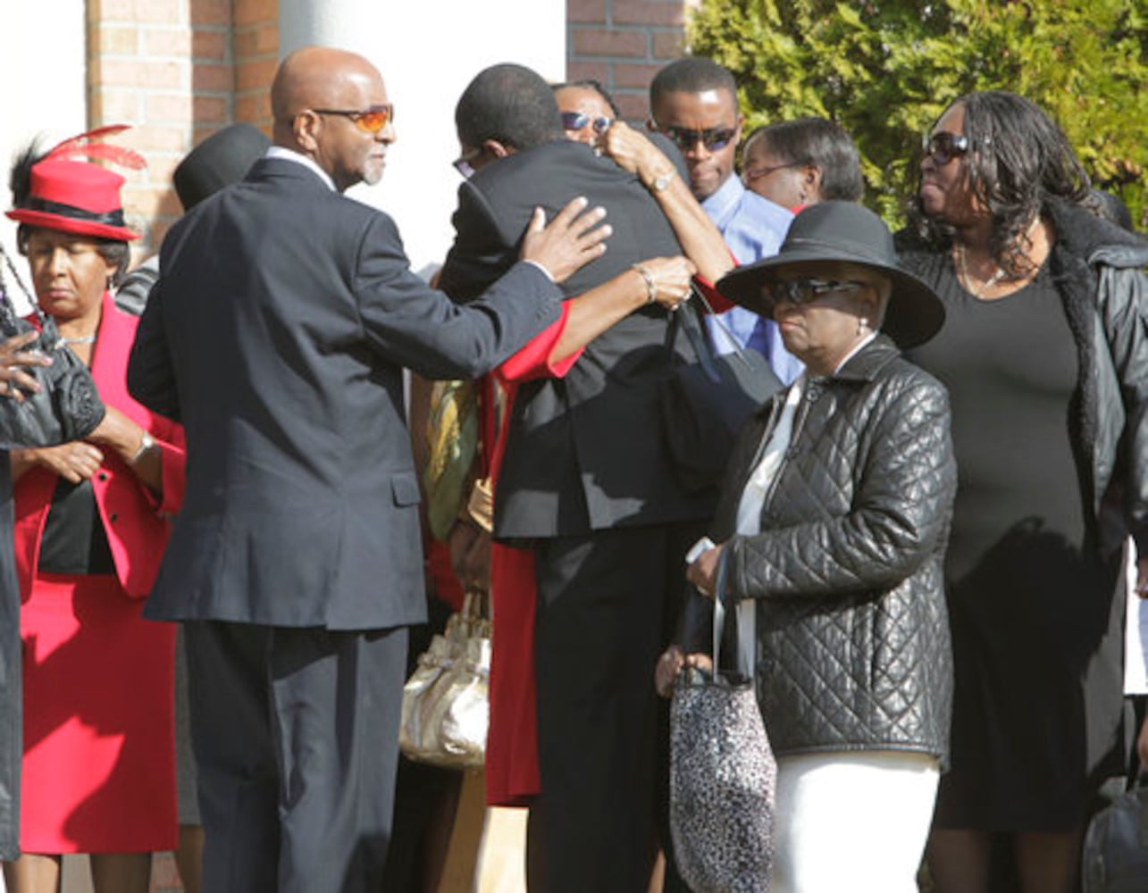Mourners gather at funeral for Slim Dunkin