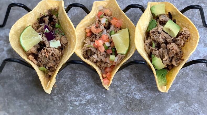 For a guilt-free taco night, top your Slow Cooker Lime Pork Tacos with fresh veggies. CONTRIBUTED BY KELLIE HYNES