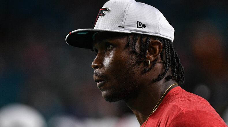Julio Jones #11 of the Atlanta Falcons on the sideline during a preseason game against the Miami Dolphins at Hard Rock Stadium on Aug. 8, 2019 in Miami.