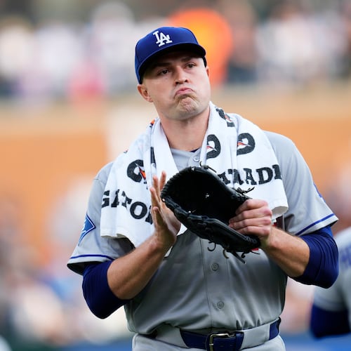 Los Angeles Dodgers pitcher Tarik Skubal claps as he walks to the dugout before the first inning of a baseball game against the Detroit Tigers Friday, Aug. 28, 2026, in Detroit. (AP Photo/Paul Sancya)