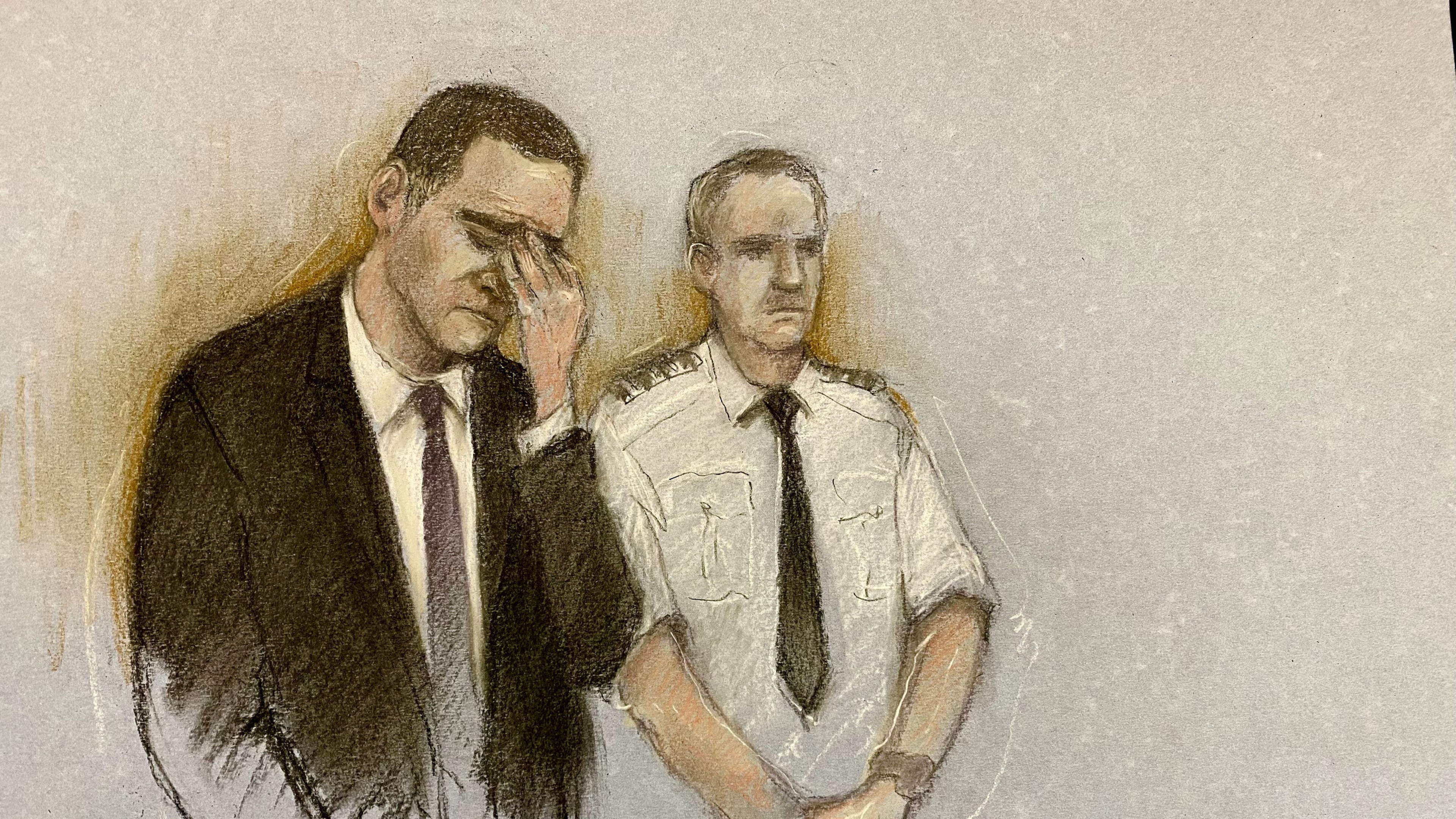 This courtroom sketch by Elizabeth Cook shows Paul Doyle appearing at Liverpool Crown Court, Tuesday Nov. 25, 2025, during his trial where he is accused of multiple offenses after allegedly driving into crowds of football fans gathered in the city centre for the Liverpool FC end of season victory parade on May 26. (Elizabeth Cook/PA via AP)