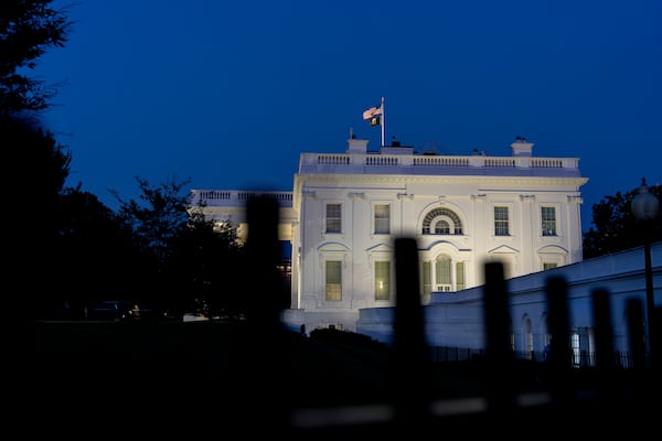 The White House is illuminated, Saturday, June 21, 2025, in Washington. (AP Photo/Alex Brandon)