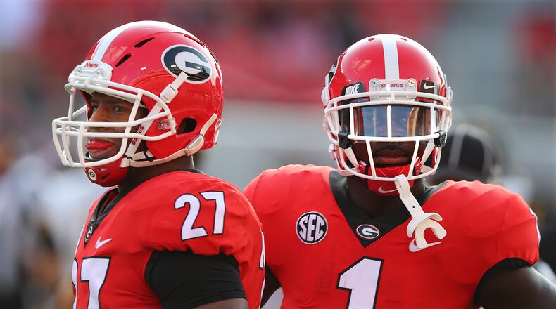 Two solid reasons why Georgia could advance to the college football playoff -- senior running backs Nick Chubb and Sony Michel. Curtis Compton/ccompton@ajc.com.