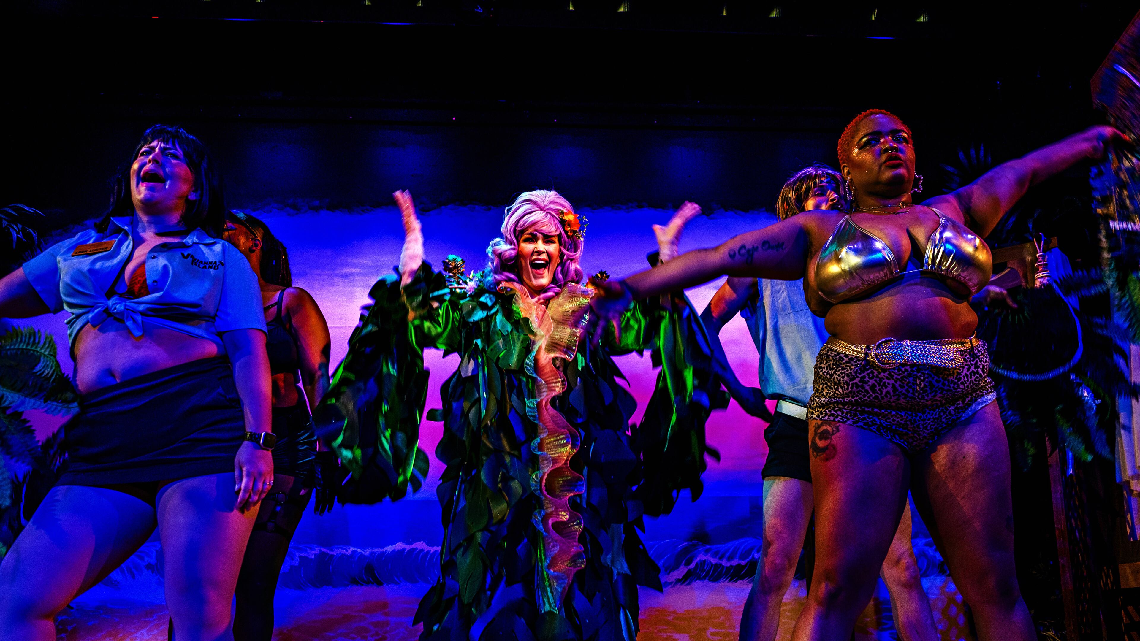 Amber Nash (center) as her sexy B-movie star character Vavianna Vardot in "Murder on Vavianna Island" at Dad’s Garage.