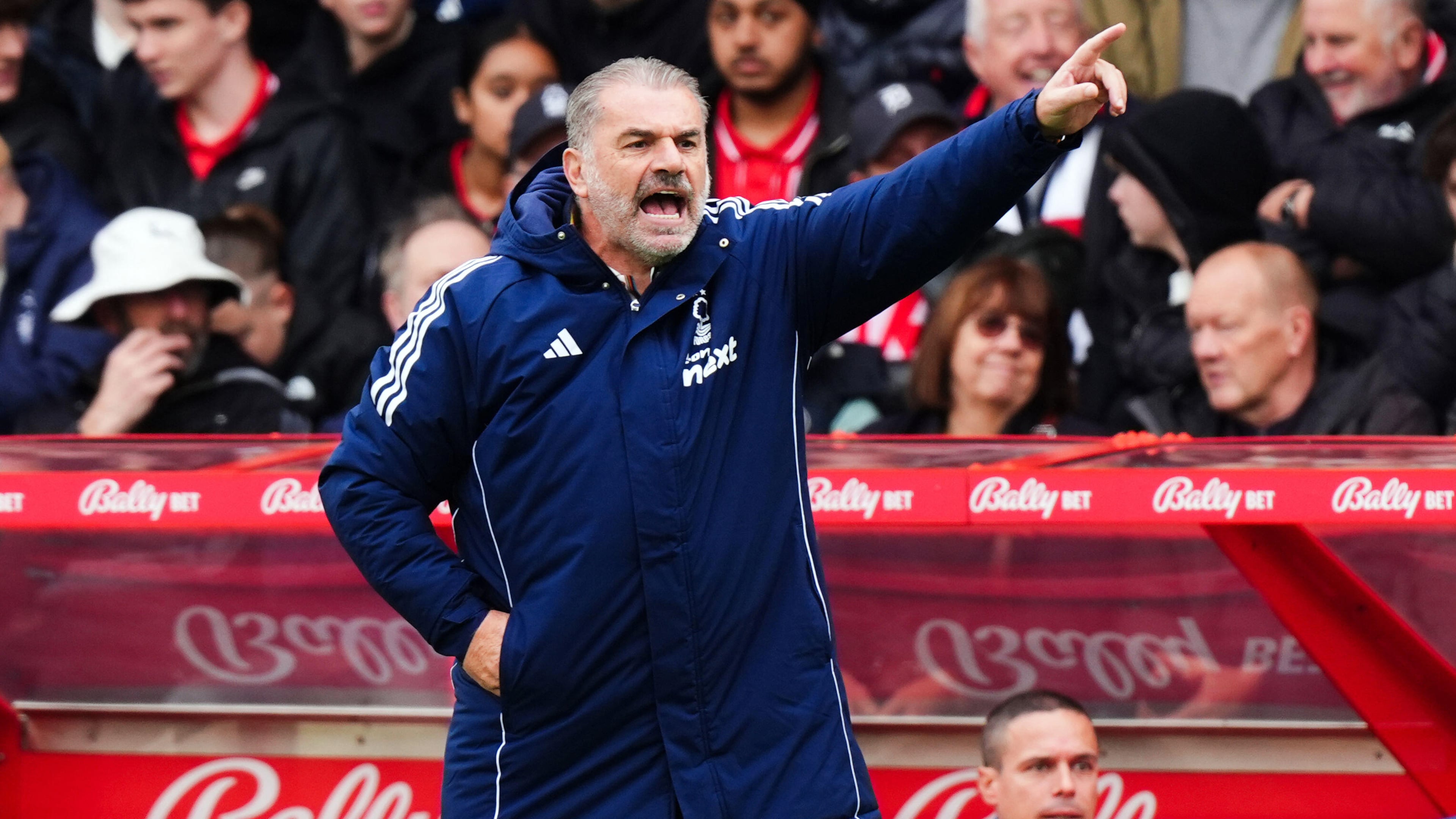 Nottingham Forest head coach Ange Postecoglou shouts instructions, during the English Premier League soccer match between Nottingham Forest and Chelsea, in Nottingham, England, Saturday, Oct. 18, 2025. (Mike Egerton/PA via AP)