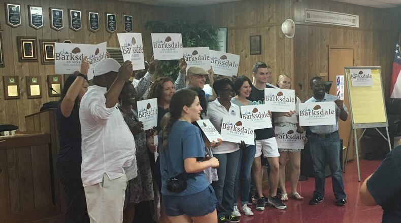 Democrat Jim Barksdale and about a dozen volunteers and staffers at a rally in Atlanta.