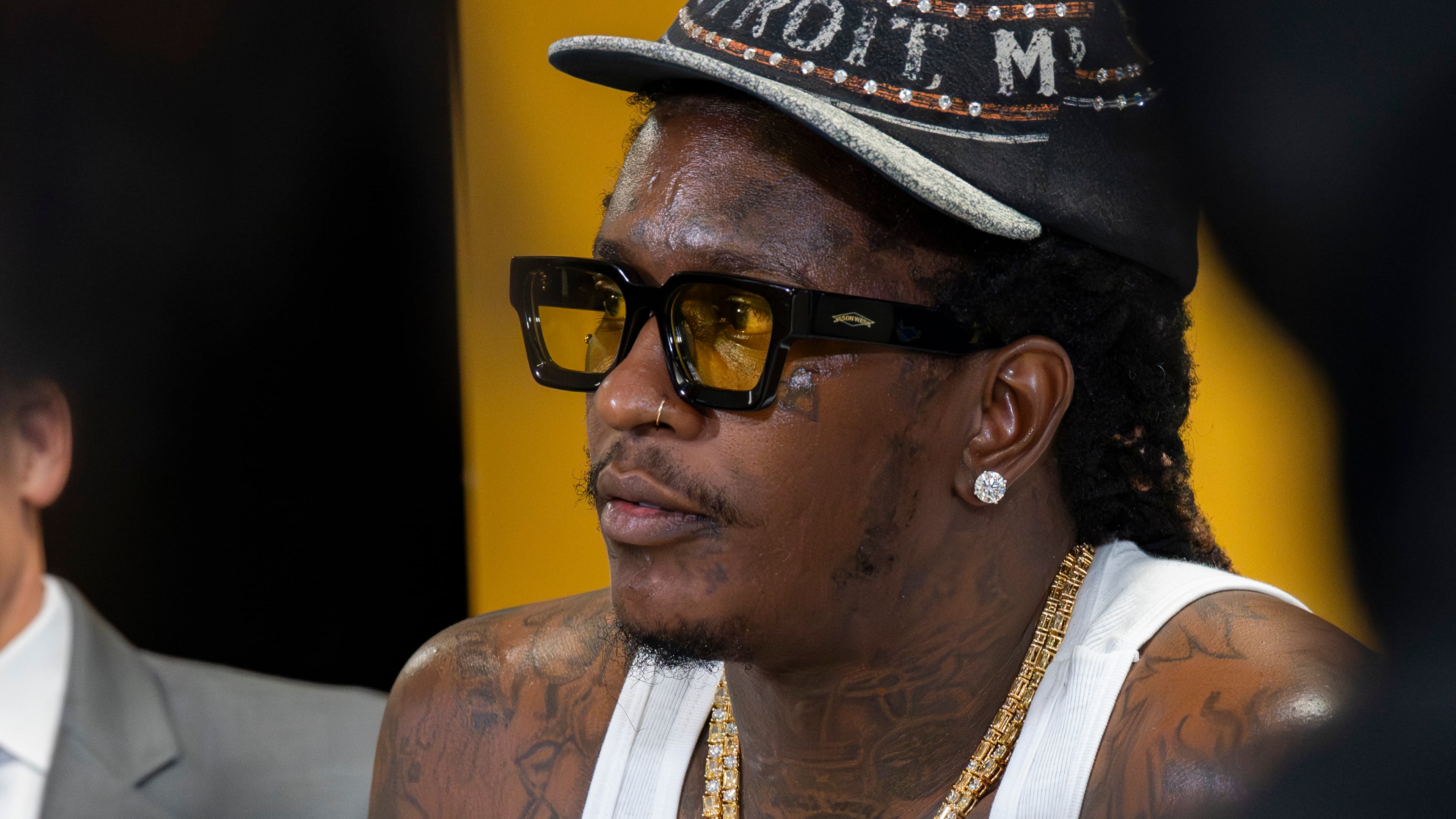 Jeffery Williams, known as rapper Young Thug, speaks to students at Skyview High School on Friday, Aug. 1, 2025, in Atlanta. The appearance is part of his court-mandated anti-gang outreach, one of the few conditions under which he is permitted to return to the city. (Olivia Bowdoin for the AJC)