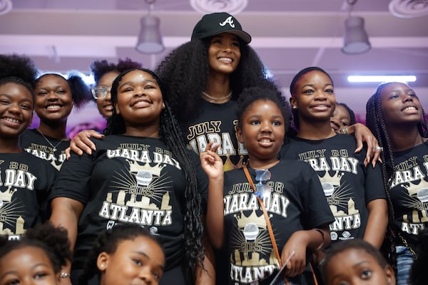 R&B singer Ciara poses with club members during the unveiling ceremony of her new Why Not You Dance Center at John H. Harland Boys & Girls Club in Atlanta on Monday, July 28, 2025. (Natrice Miller/ AJC)