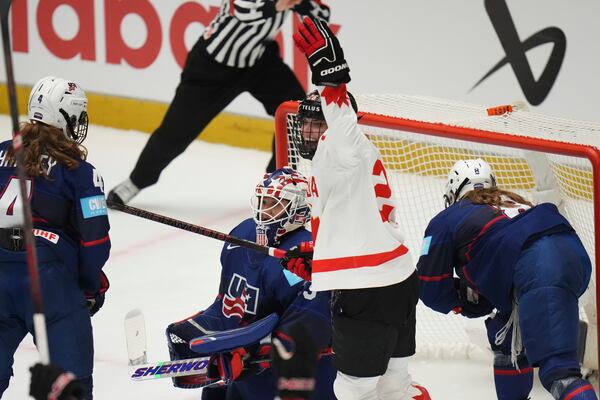 Canada's Emily Clark celebrate after a goal during the gold medal match between Canada and United States at the Women's Ice Hockey Championships in Ceske Budejovice, Czech Republic, Sunday, April 20, 2025. (AP Photo/Petr David Josek)