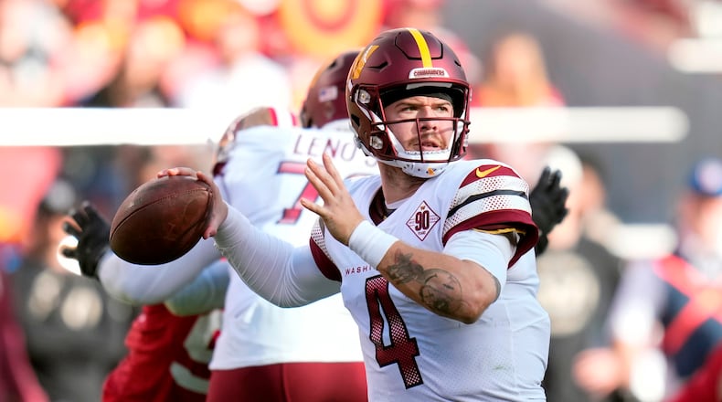 FILE - Washington Commanders quarterback Taylor Heinicke throws a pass in the first half of an NFL football game against the San Francisco 49ers, Dec. 24, 2022, in Santa Clara, Calif. (AP Photo/Godofredo A. Vásquez, File)