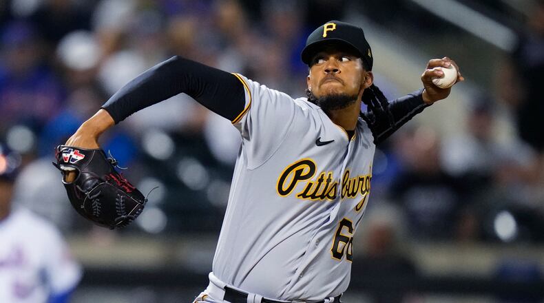 Pittsburgh Pirates' Angel Perdomo pitches during the seventh inning of the team's baseball game against the New York Mets on Tuesday, Aug. 15, 2023, in New York. (AP Photo/Frank Franklin II)