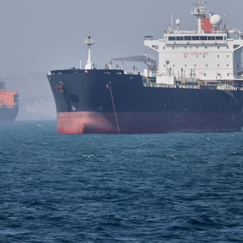Oil tankers sit at anchor offshore in the Strait of Hormuz off Bandar Abbas, Iran, Saturday, May 2, 2026. (Amirhosein Khorgooi/ISNA via AP)