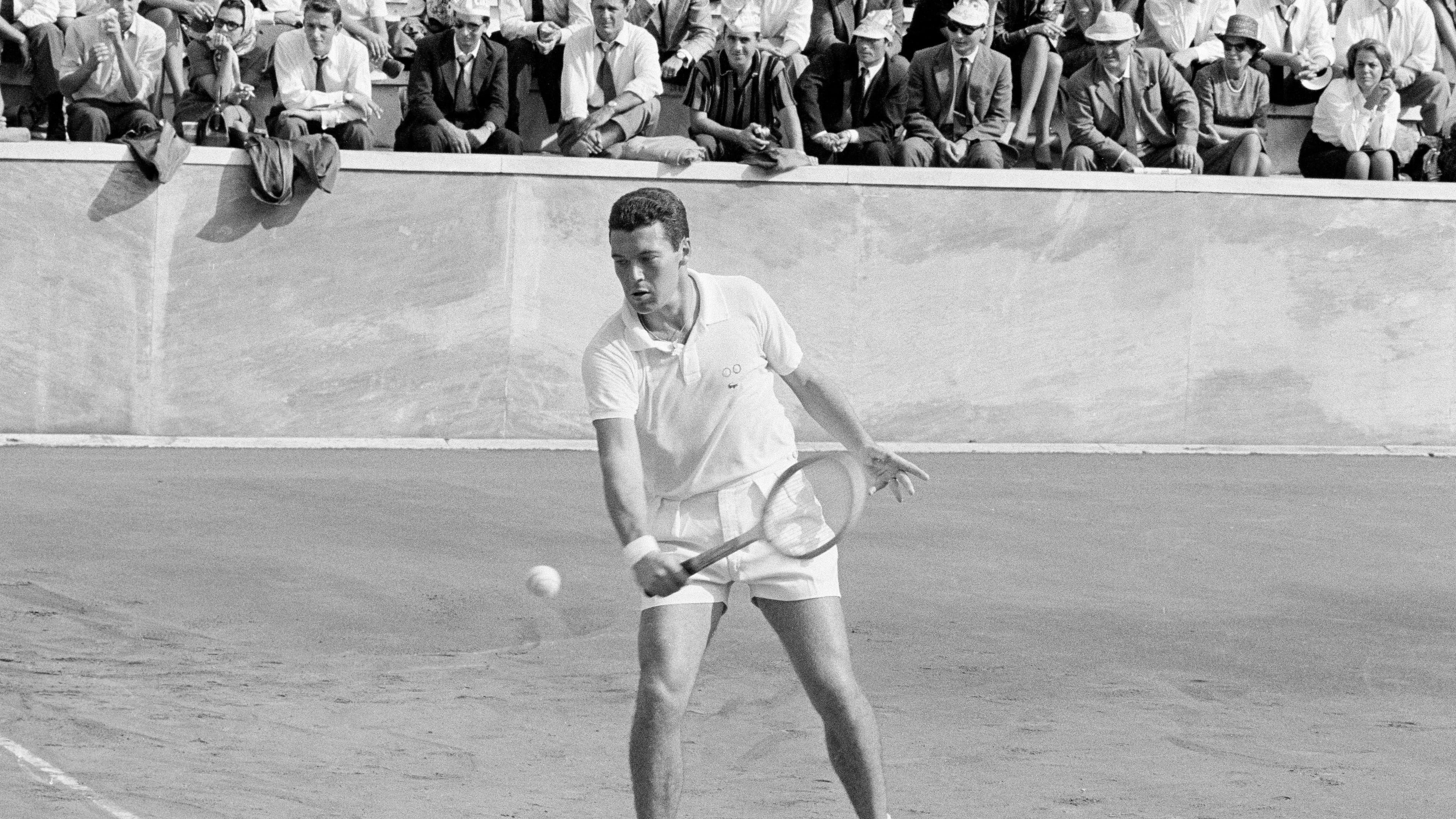 FILE - Italy's Nicola Pietrangeli in action during his Davis Cup singles tennis match against United States' Jon Douglas, in Rome, Oct. 16, 1961. (AP Photo/Mario Torrisi, File)
