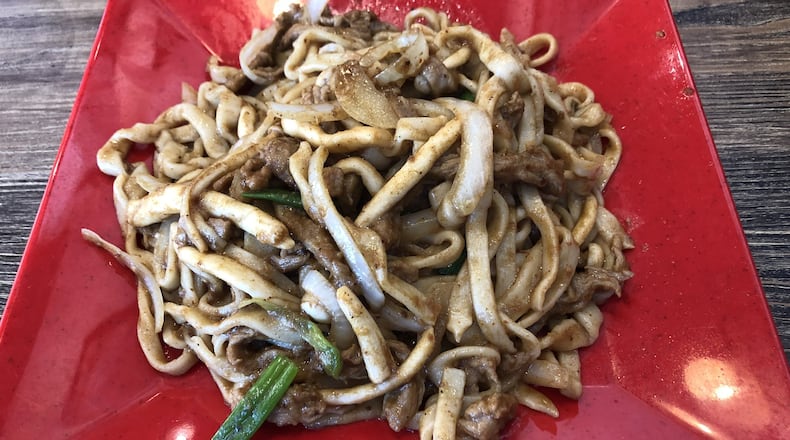 The sha cha beef noodles at Xiao’s Way Noodle House in Johns Creek are bathed in a nutty, umami-rich Taiwanese barbecue sauce, and they are positively addictive. CONTRIBUTED BY WENDELL BROCK