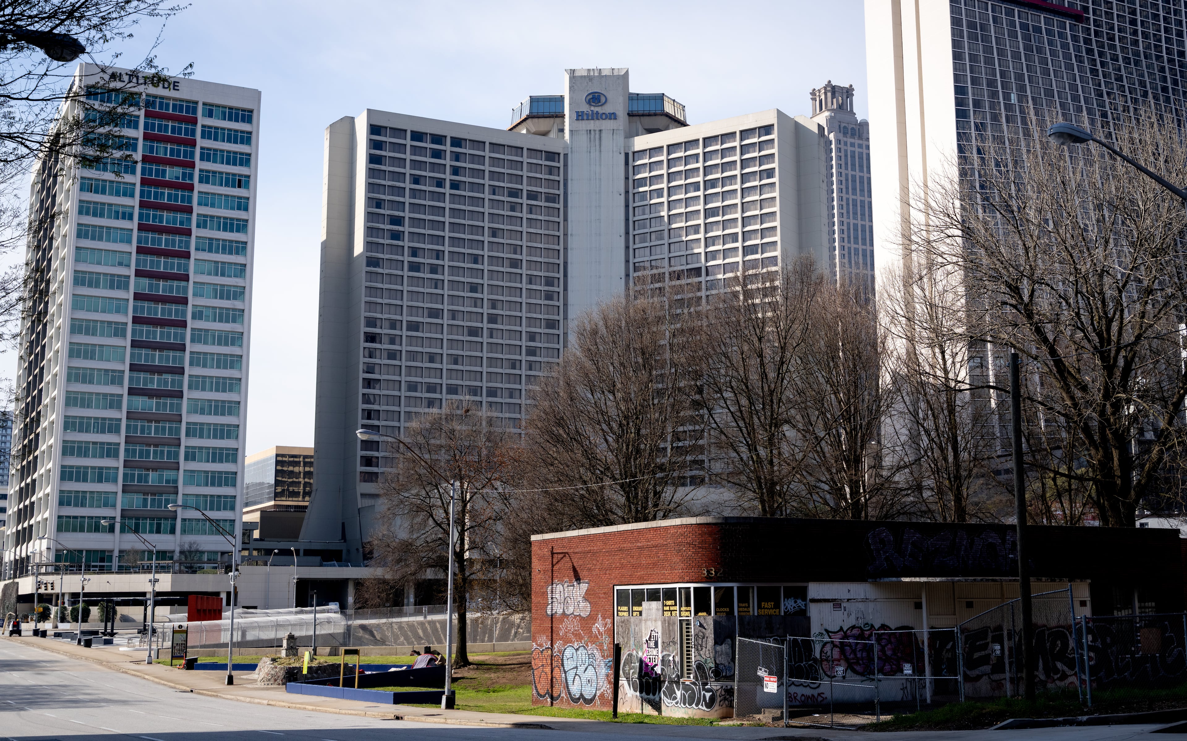 The Hilton Atlanta hotel building stands along Courtland Street in downtown Atlanta, Georgia, on March 13, 2025 (Ben Hendren for the AJC)
