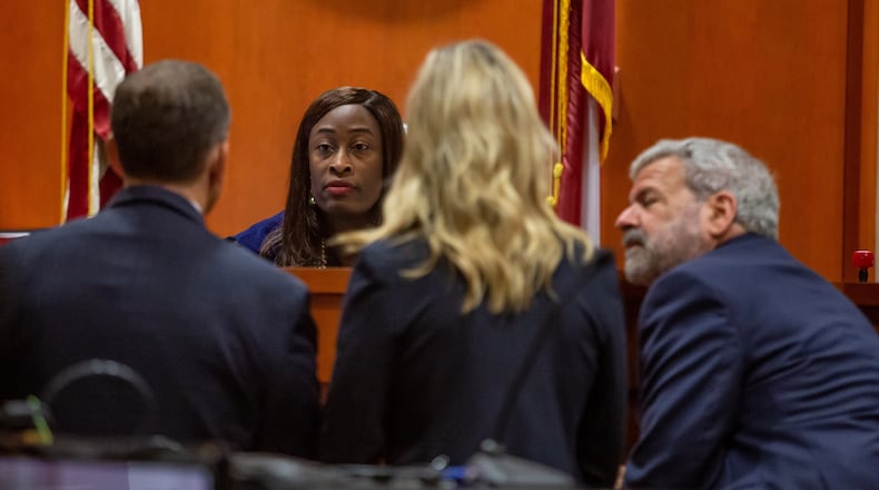 Judge Latisha Dear Jackson, talks with the lawyers about a jury note during the trial of Robert âChipâ Olsen at the DeKalb County Courthouse October 7, 2019.  STEVE SCHAEFER / SPECIAL TO THE AJC