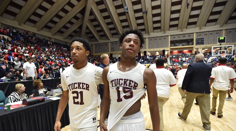 March 9, 2019 Macon - Tucker Myles Parker (21) and Tucker Raylan Barrion (15) react to their loss in GHSA State Basketball Championship game at the Macon Centreplex in Macon on Saturday, March 9, 2019. Tri-Cities won 46-43 over the Tucker. HYOSUB SHIN / HSHIN@AJC.COM