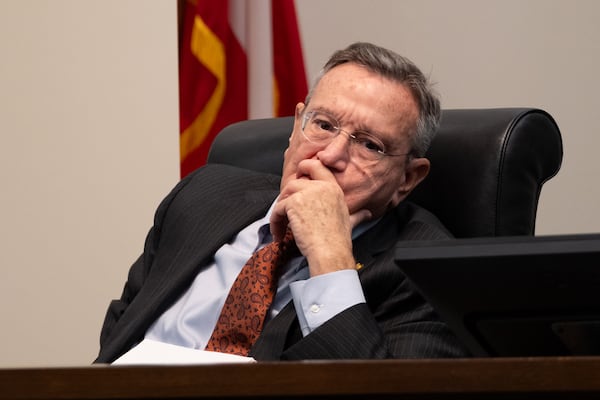 Georgia Judicial Qualifications Commission panelist Richard Hyde listens during a hearing in Atlanta on Dec. 19, 2024. (Ben Gray for The Atlanta Journal-Constitution)