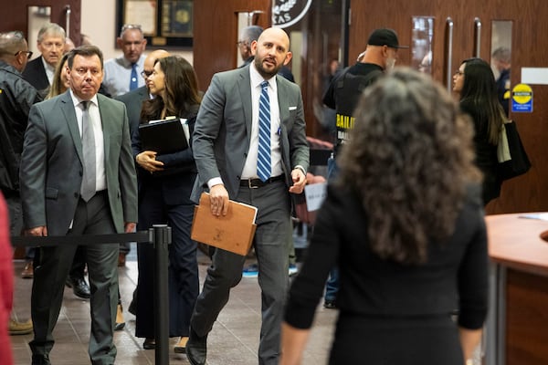 El Paso District Attorney James Montoya walks outside the 409th District Court after Patrick Crusius pleaded guilty in the death of 23 people in the Aug. 3. 2019 Walmart Mass shooting, Monday, April 21, 2025, in El Paso, Texas. (AP Photo/Ivan Pierre Aguirre)