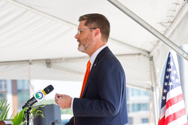 Sean McMaster, administrator of the Federal Highway Administration, said at the Ga. 400 express lane project groundbreaking ceremony Wednesday, April 22, 2026: Traffic is “a hidden tax on our economy and on our drivers.”  (Arvin Temkar/AJC)