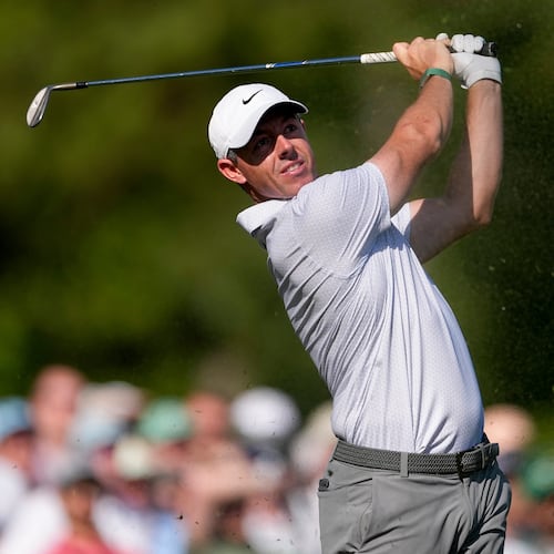 Rory McIlroy, of Northern Ireland, watches his tee shot on the 12th hole during the second round of the Masters golf tournament at the Augusta National Golf Club, Friday, April 10, 2026, in Augusta, Ga. (AP Photo/Eric Gay)