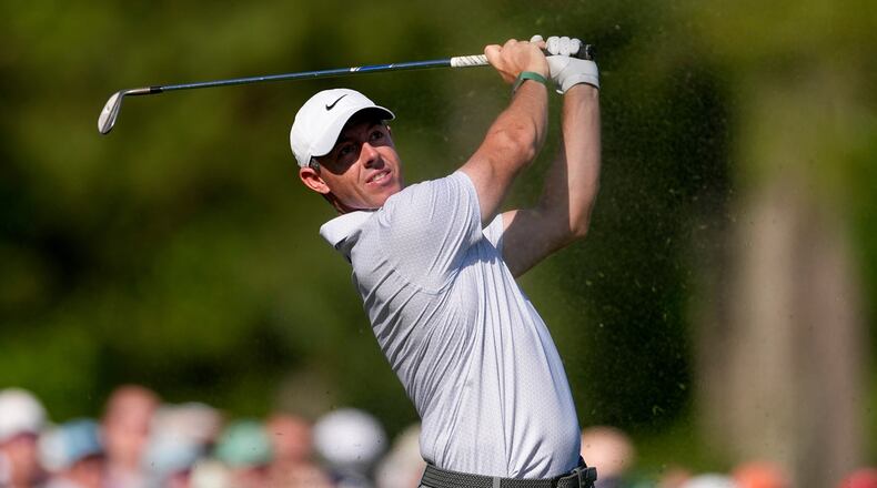 Rory McIlroy, of Northern Ireland, watches his tee shot on the 12th hole during the second round of the Masters golf tournament at the Augusta National Golf Club, Friday, April 10, 2026, in Augusta, Ga. (AP Photo/Eric Gay)