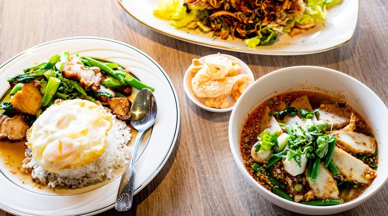Brunch items from Thaicoon & Sushi Bar include (from left) Kana Moo Krob (fried kale with crispy pork and rice), Pla Lui Suan (lightly battered fried catfish with spicy toppings) and Tom Yum Noodle Soup. CONTRIBUTED BY HENRI HOLLIS
