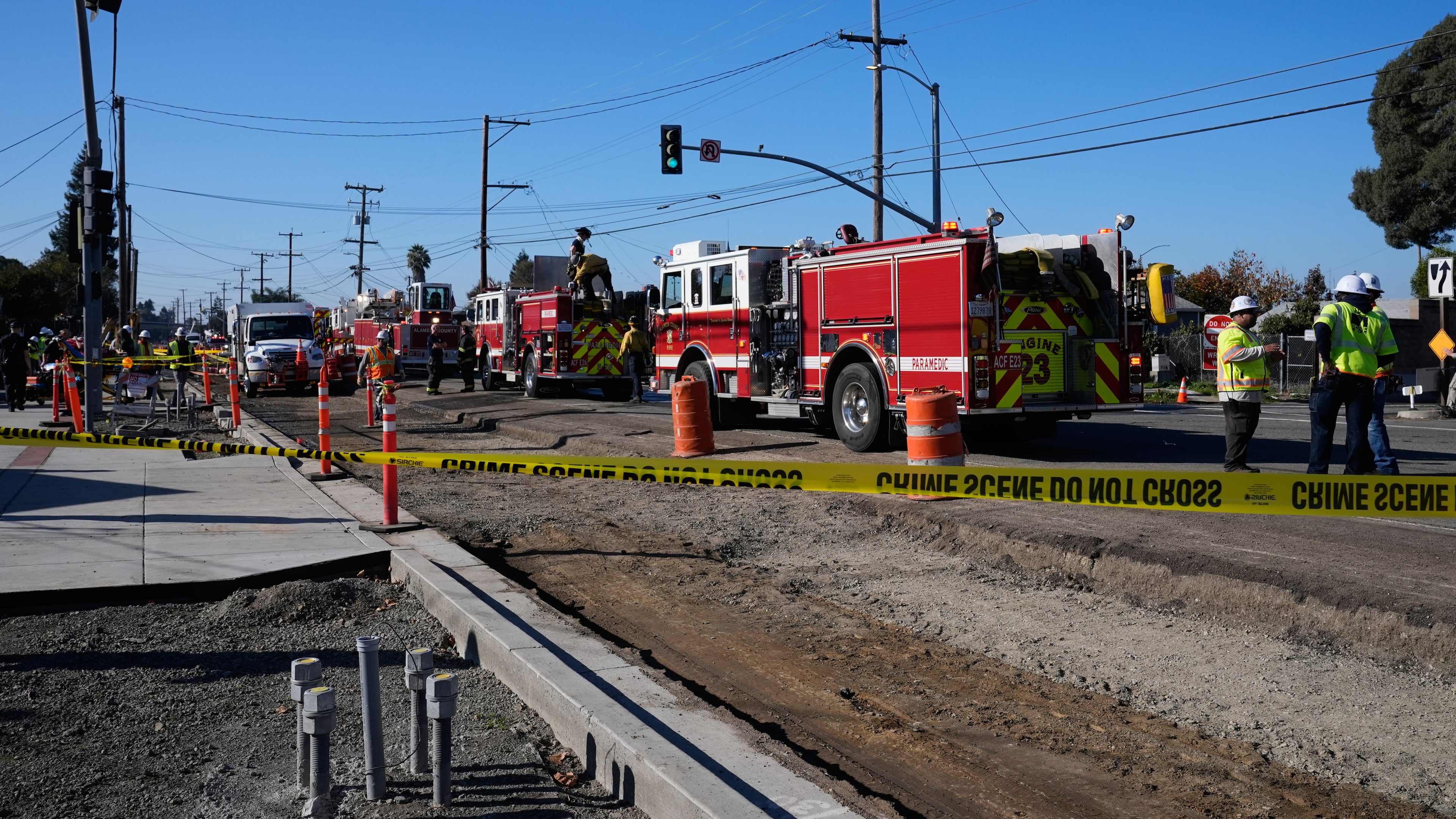 Emergency vehicles are lined up at the scene of a gas explosion Thursday, Dec. 11, 2025, in Hayward, Calif. (AP Photo/Godofredo A. Vásquez)