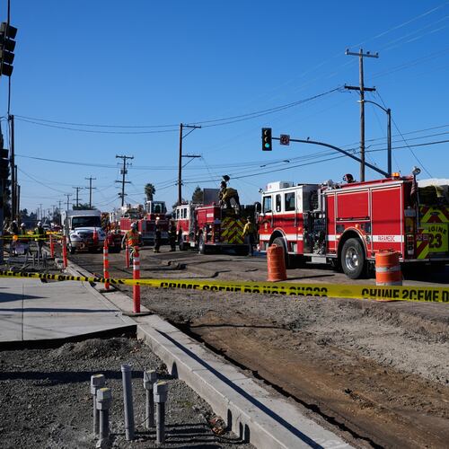 Emergency vehicles are lined up at the scene of a gas explosion Thursday, Dec. 11, 2025, in Hayward, Calif. (AP Photo/Godofredo A. Vásquez)