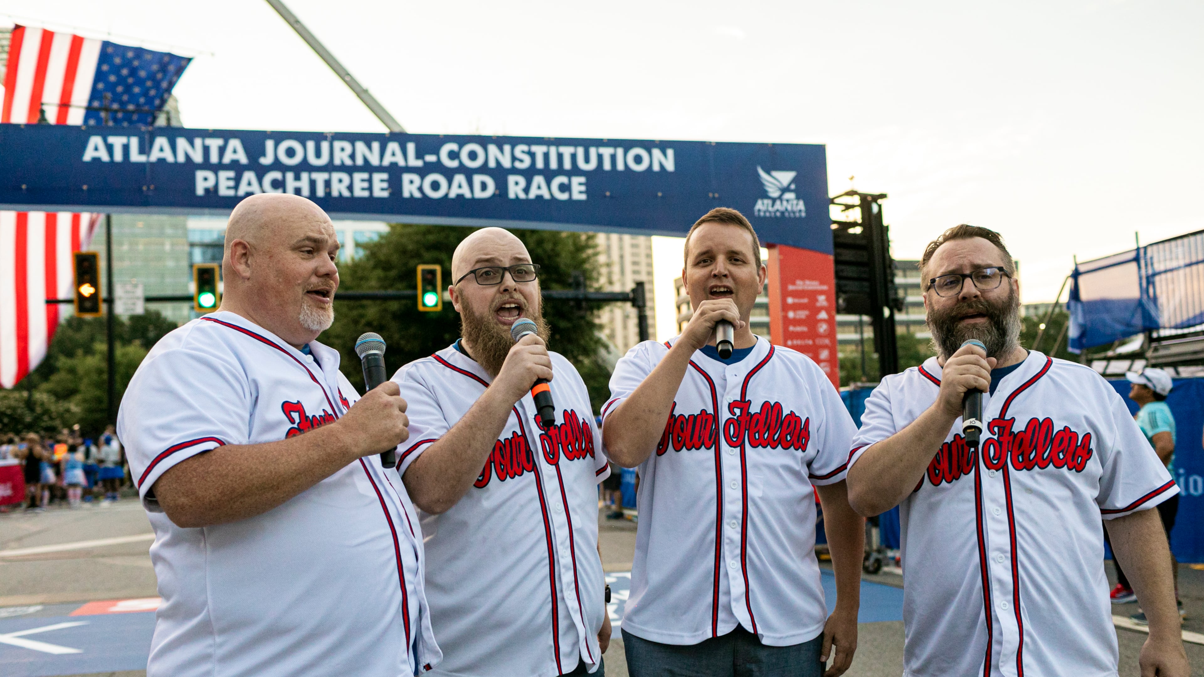 The Four Fellers perform the national anthem ahead of the 2024 AJC Peachtree Road Race (Credit: Joaquin Lara for Atlanta Track Club)