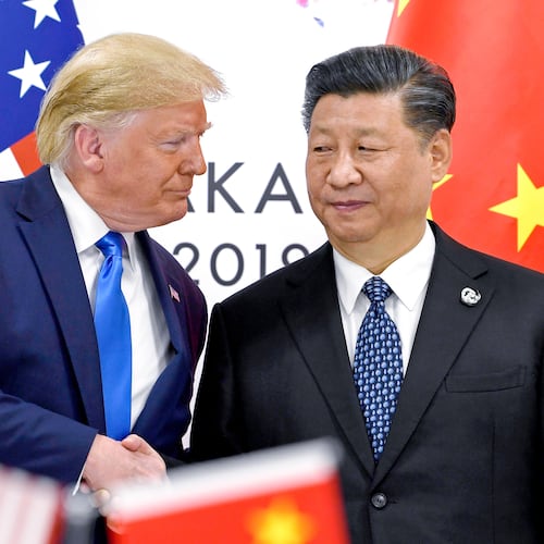 FILE - President Donald Trump, left, shakes hands with China's President Xi Jinping during a meeting on the sidelines of the G-20 summit in Osaka, Japan, June 29, 2019. (AP Photo/Susan Walsh, File)