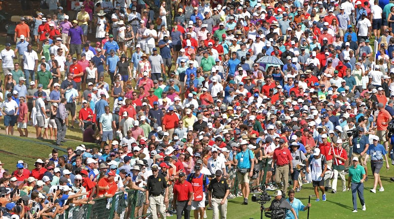 There'll be no great gathering of golf fans at East Lake and the Tour Championship this year - as there was for Tiger Woods during his 2018 victory. (Hyosub Shin/Atlanta Journal-Constitution/TNS)